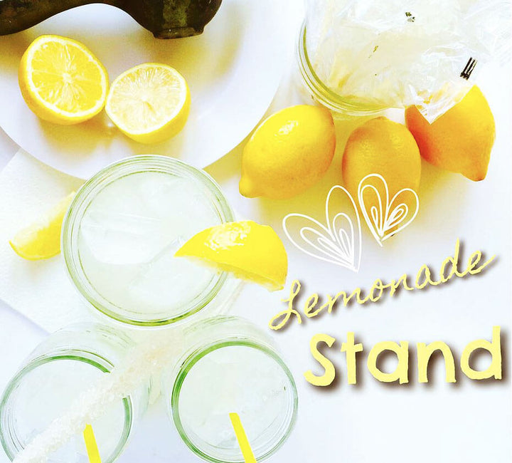 Lemonade with fresh lemons and text Lemonade Stand