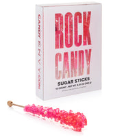 A box of Candy Envy's Pink Cherry Flavored Rock Candy Sugar Sticks with one stick unwrapped showing pink crystalline sugar.