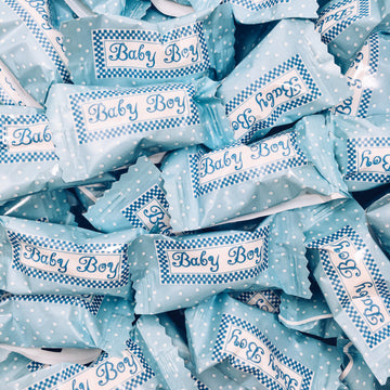 Buttermints with Light Blue Wrappers with "Baby Boy" written on them.