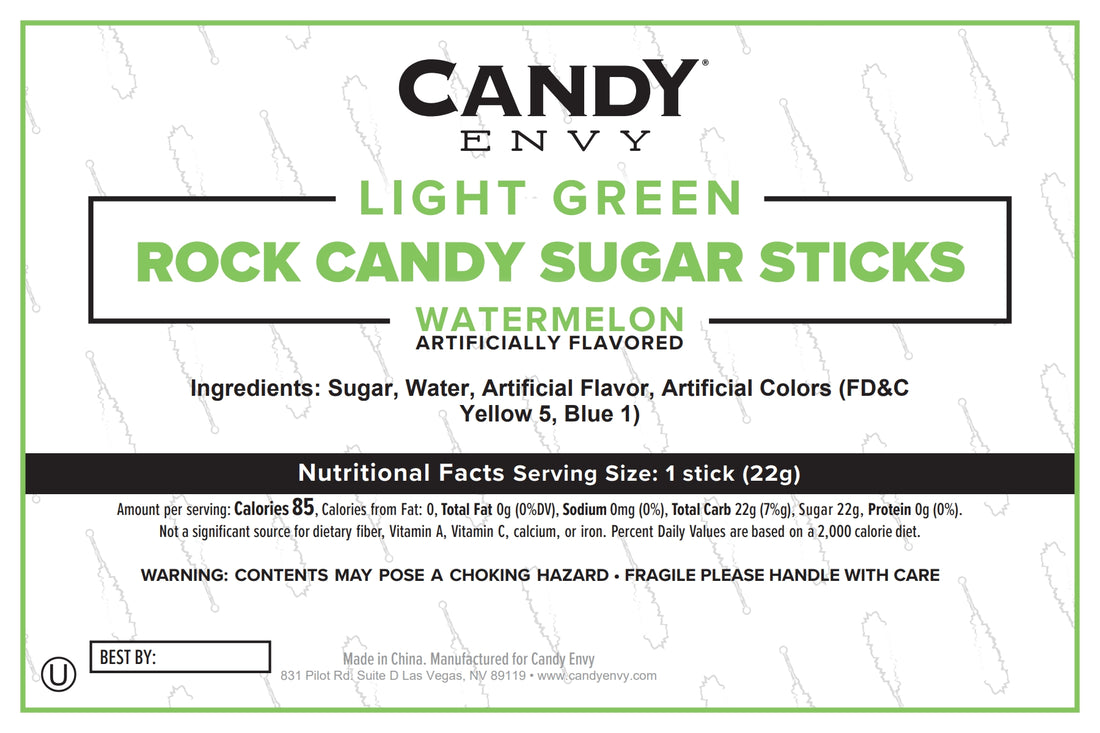 Front label of a pack of Candy Envy Light Green Rock Candy Sugar Sticks, Watermelon flavor, showing product name, ingredients (sugar, water, artificial flavor, artificial colors (fd&c yellow 5, blue), nutritional facts, and handling instructions on a white background with faint watermark text.
