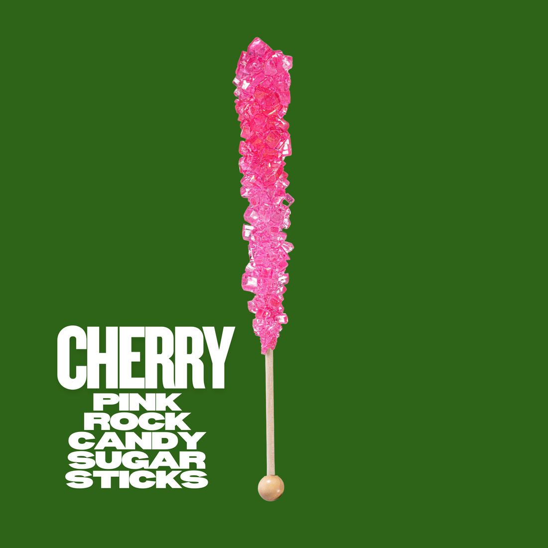 Unwrapped pink rock candy in front of complimentary color green background.